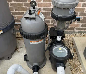 Pool pump, filter and salt cell plumbed on an equipment pad